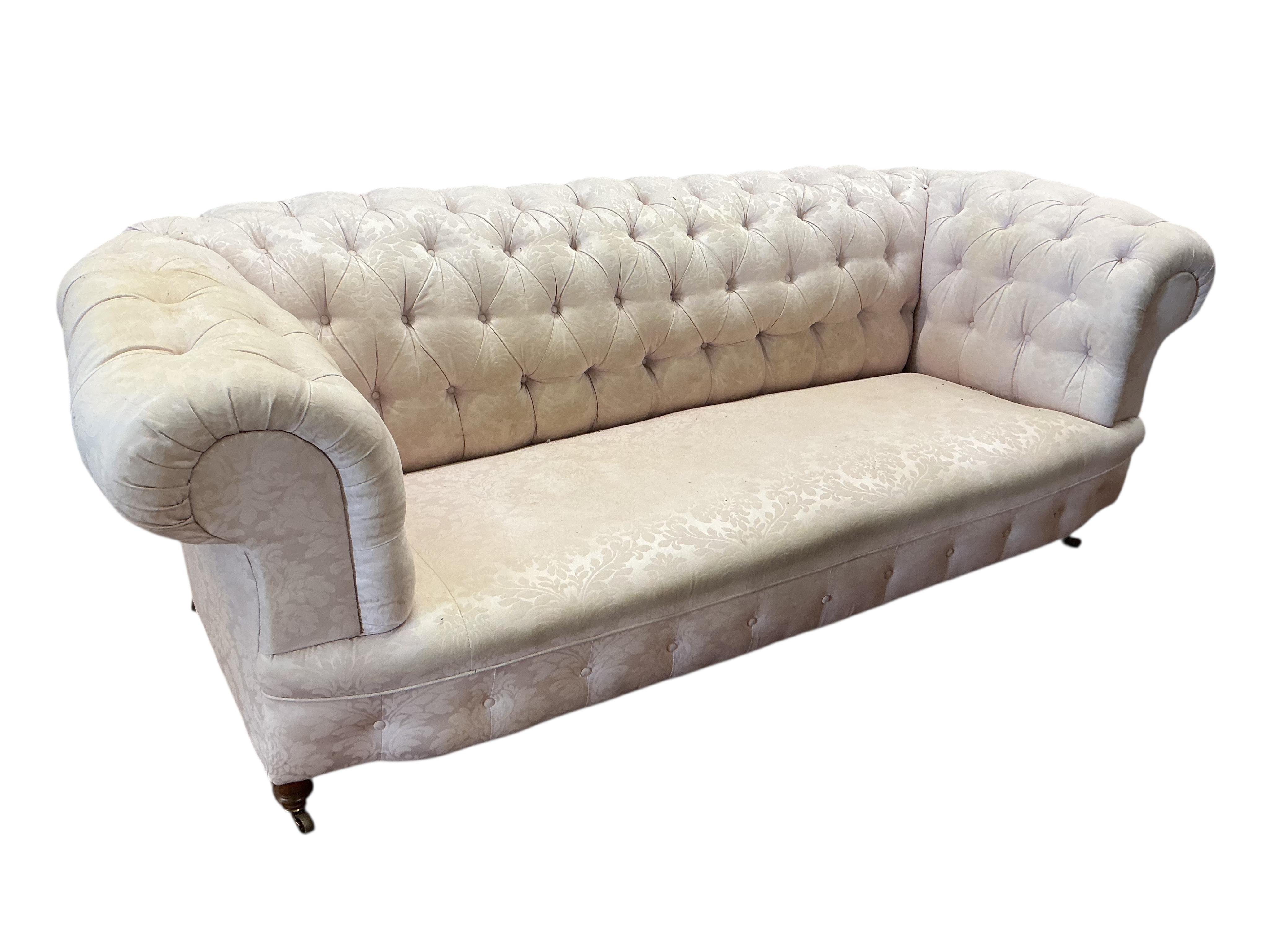 A Victorian deep buttoned Chesterfield settee, width 236cm, depth 91cm, height 84cm